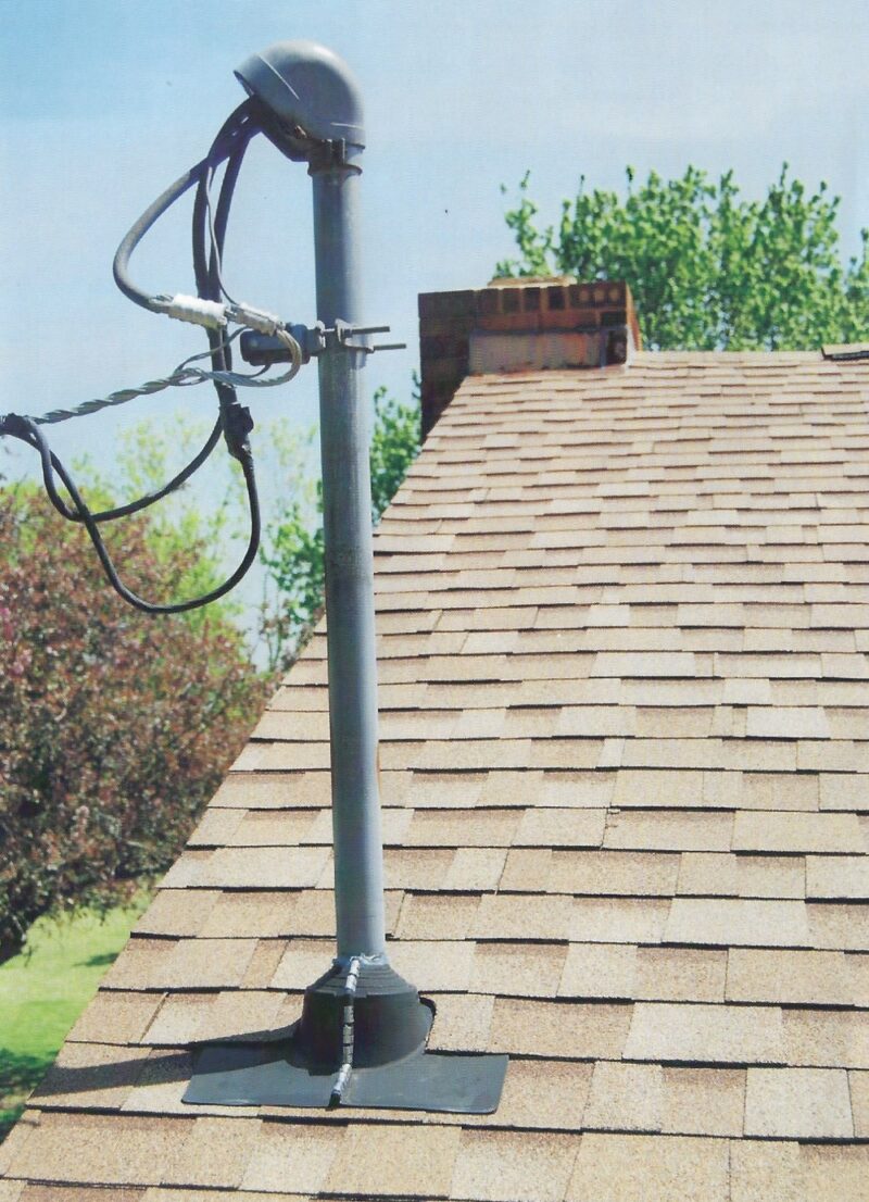 Residential ZipSeal Retrofit Flashing for Electrical Mast on Asphalt